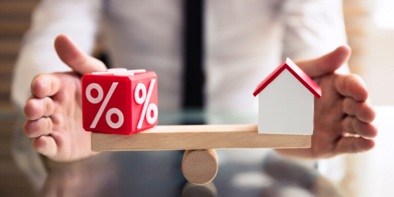 Balanza de equilibrio entre porcentaje y casa